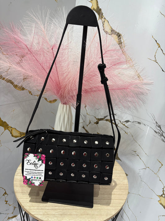 Bolso tachuelas pequeño .