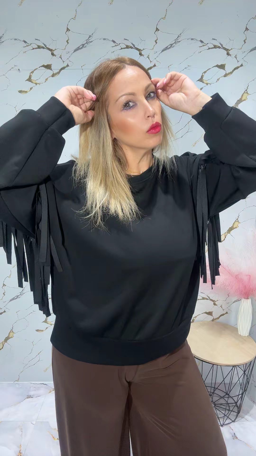 Sudadera flecos