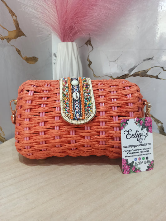 Bolso naranja conchas